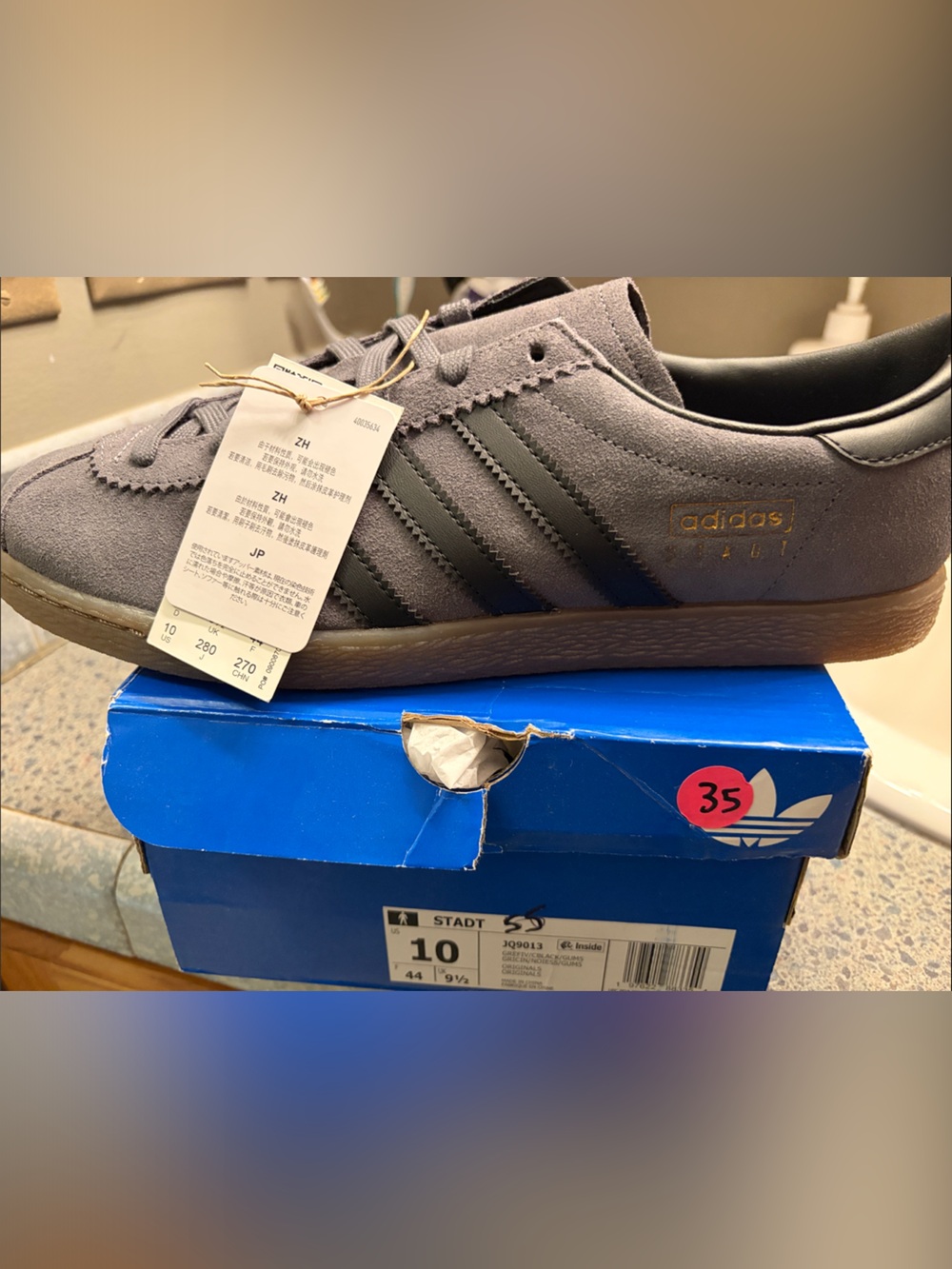 adidas Men’s Suede Sneakers in Gray with Black Stripes